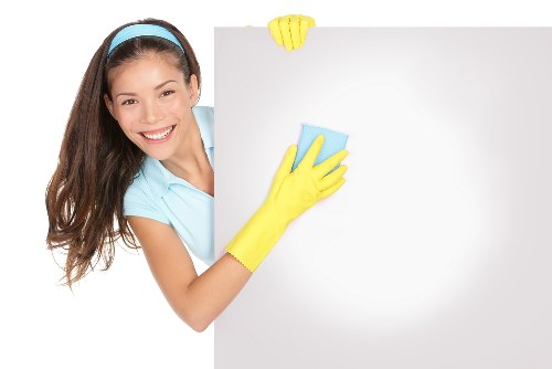 Mayfair cleaner preparing a polished office reception area